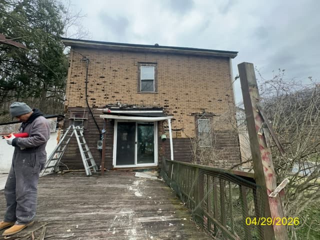 Siding Replacement before - Exterior